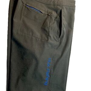 Huk Black Cargo performance board fishing Pants 38 with Blue Accent